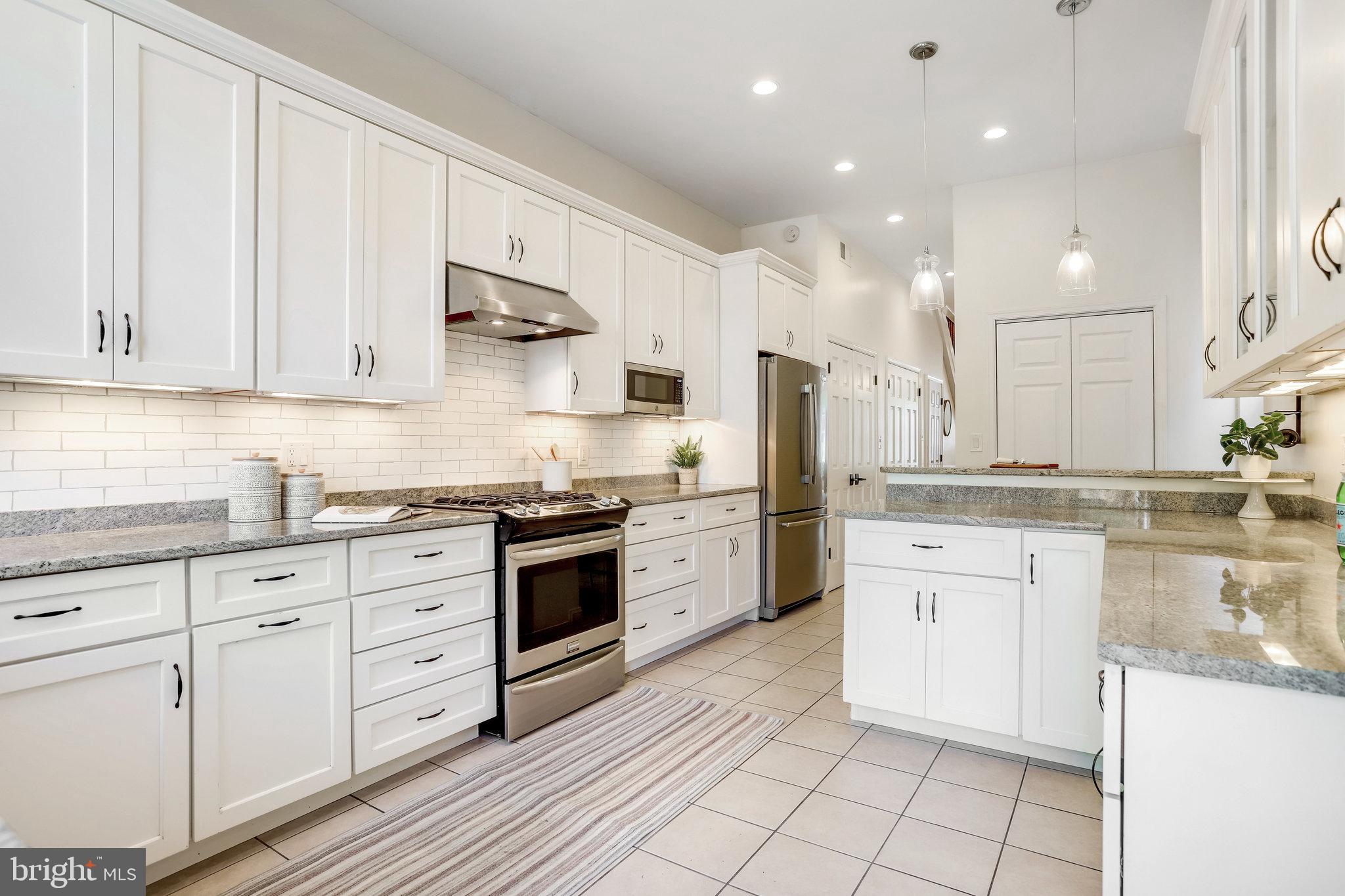 1630 6th Street Northwest Washington, DC 20001 - Photo 13 of 34 Oodles of cabinets and granite countertops