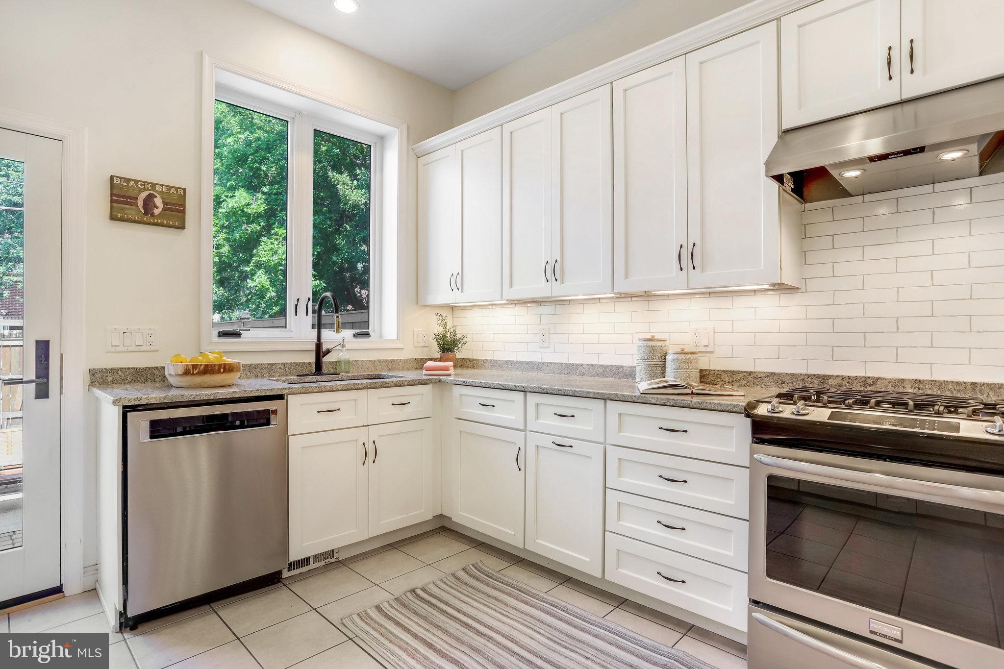 1630 6th Street Northwest Washington, DC 20001 - Photo 14 of 34 Huge window looks onto DEEP private patio +PARKING