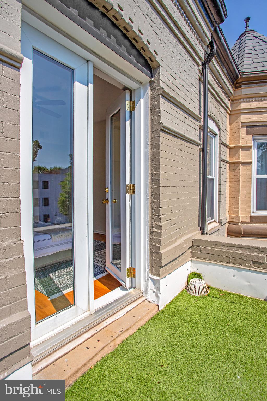 1630 6th Street Northwest Washington, DC 20001 - Photo 23 of 34 French doors to Juliet balcony in primary BR