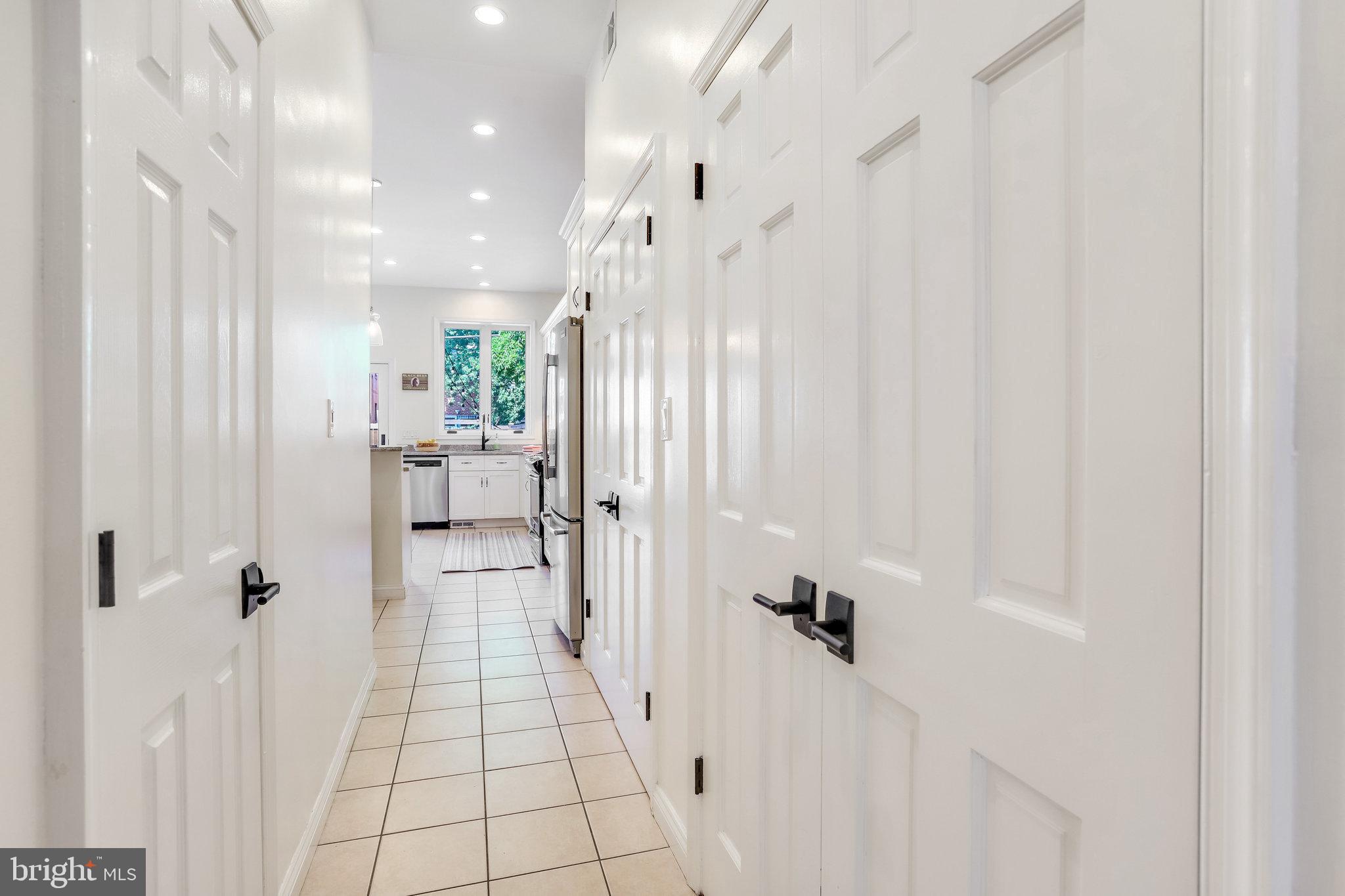 1630 6th Street Northwest Washington, DC 20001 - Photo 9 of 34 Hall w/coat closet, pantry, full bath and STORAGE