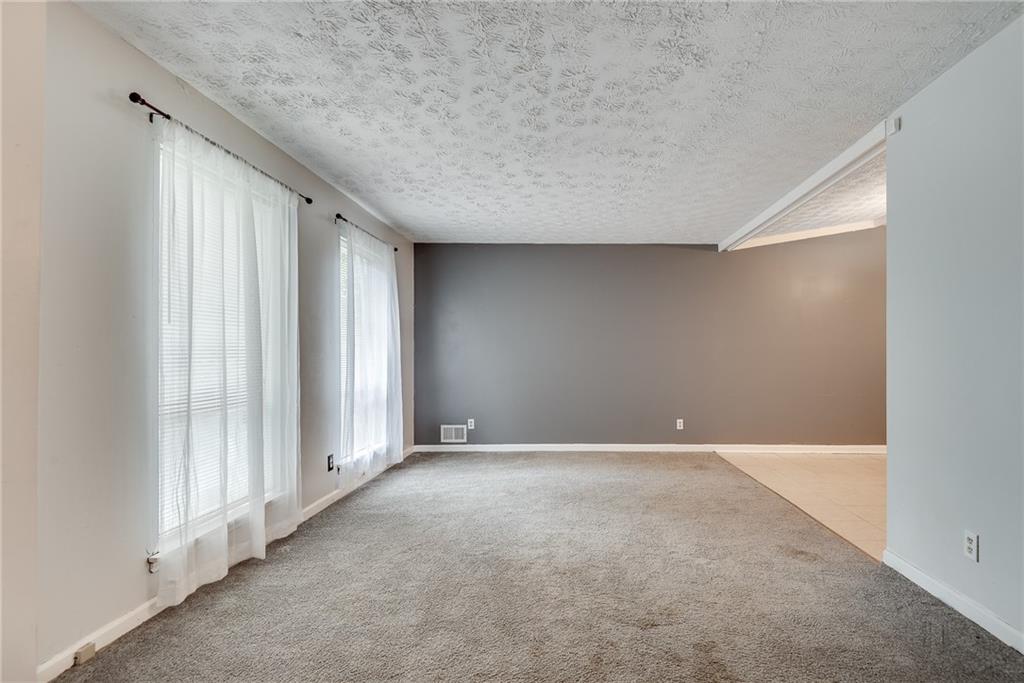 5611 Whittondale Road Lithonia, GA 30058 - Photo 5 of 34 a view of an empty room