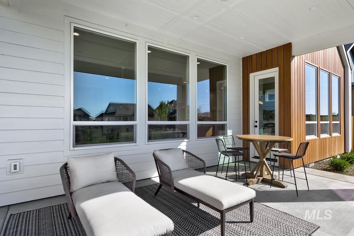 6909 Campolina Way Star, ID 83669 - Photo 27 of 39 Balcony with outdoor dining space