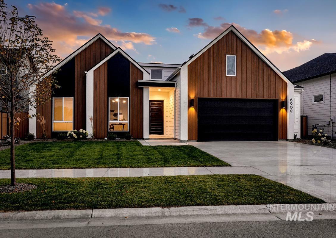 6909 Campolina Way Star, ID 83669 - Photo 30 of 39 Modern home with driveway and a garage