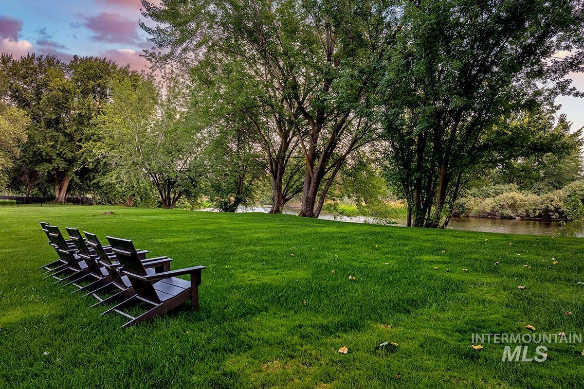 6909 Campolina Way Star, ID 83669 - Photo 35 of 39 Yard at dusk with a lawn