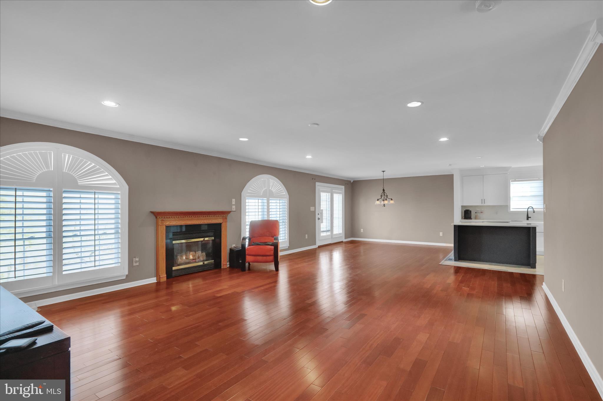 18 Bowes Lane Reading, PA 19606 - Photo 4 of 34 a view of empty room with a fireplace and wooden floor