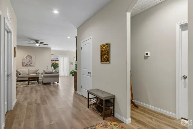a living room with furniture and a table