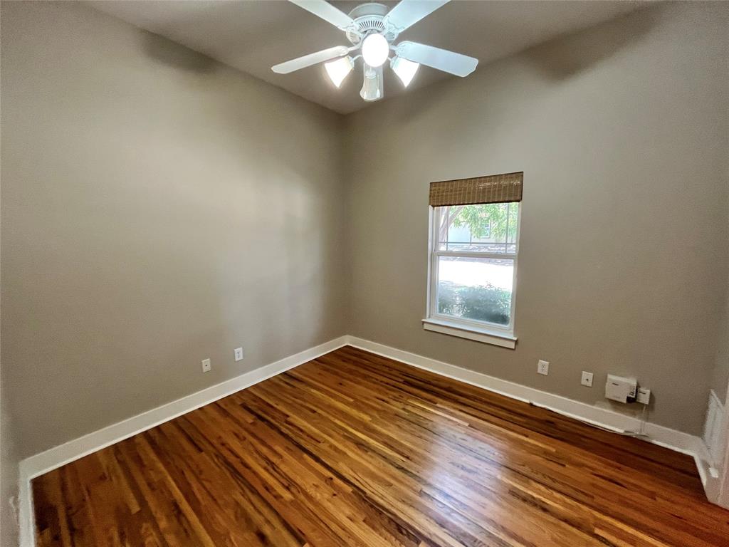 709 Roberts Street Denton, TX 76209 - Photo 24 of 35 Another comfortable bedroom, ideal for guests or a home office.