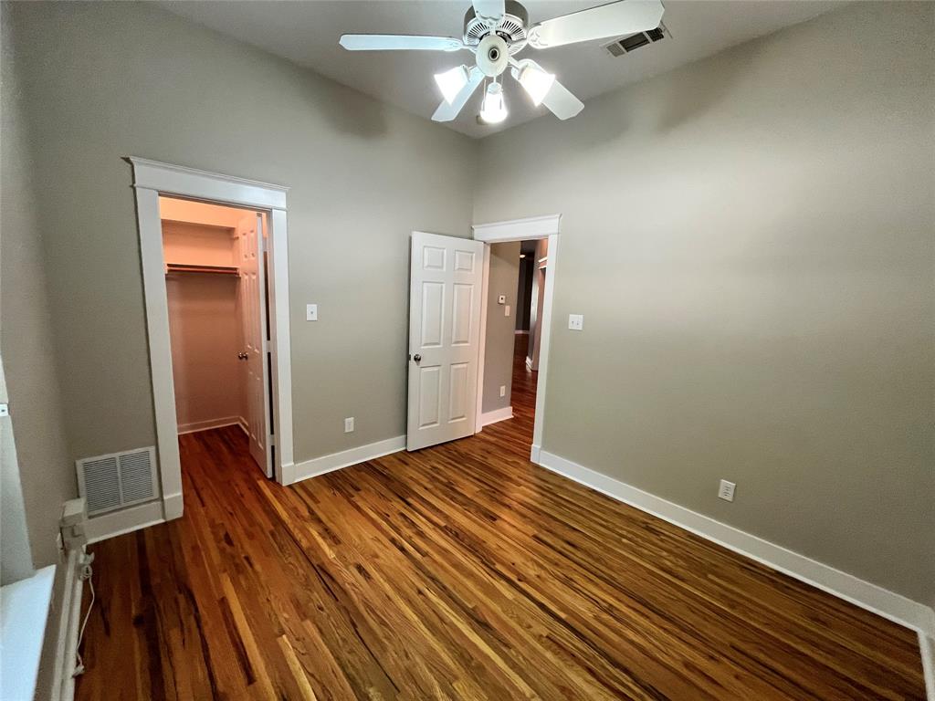 709 Roberts Street Denton, TX 76209 - Photo 25 of 35 View of the bedroom entryway and continued hardwood floors.