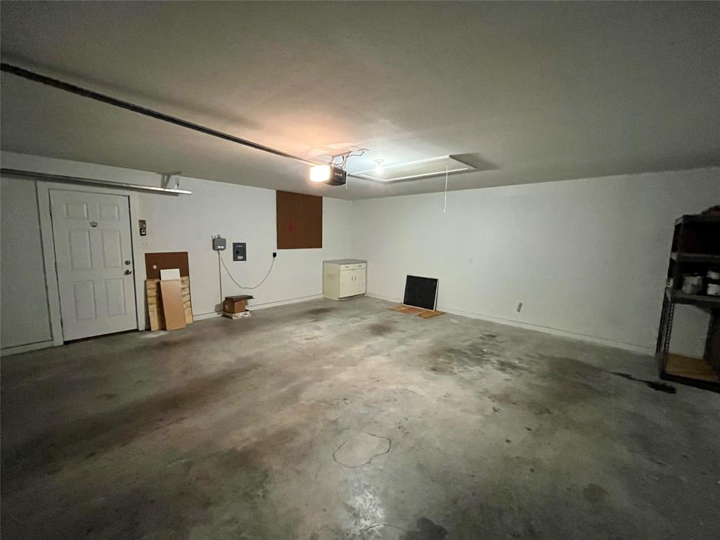 709 Roberts Street Denton, TX 76209 - Photo 29 of 35 Another view of the garage showing the spacious interior.
