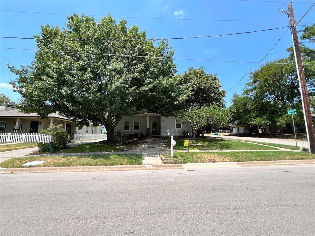 709 Roberts Street Denton, TX 76209 - Photo 30 of 35 Street view of the property highlighting the large corner lot.