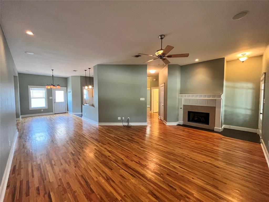 709 Roberts Street Denton, TX 76209 - Photo 4 of 35 Another view of the spacious living area, perfect for entertainment.