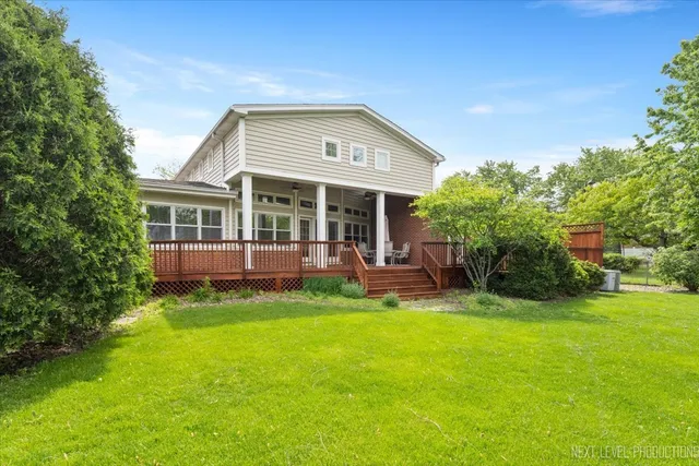 a front view of a house with a yard and porch