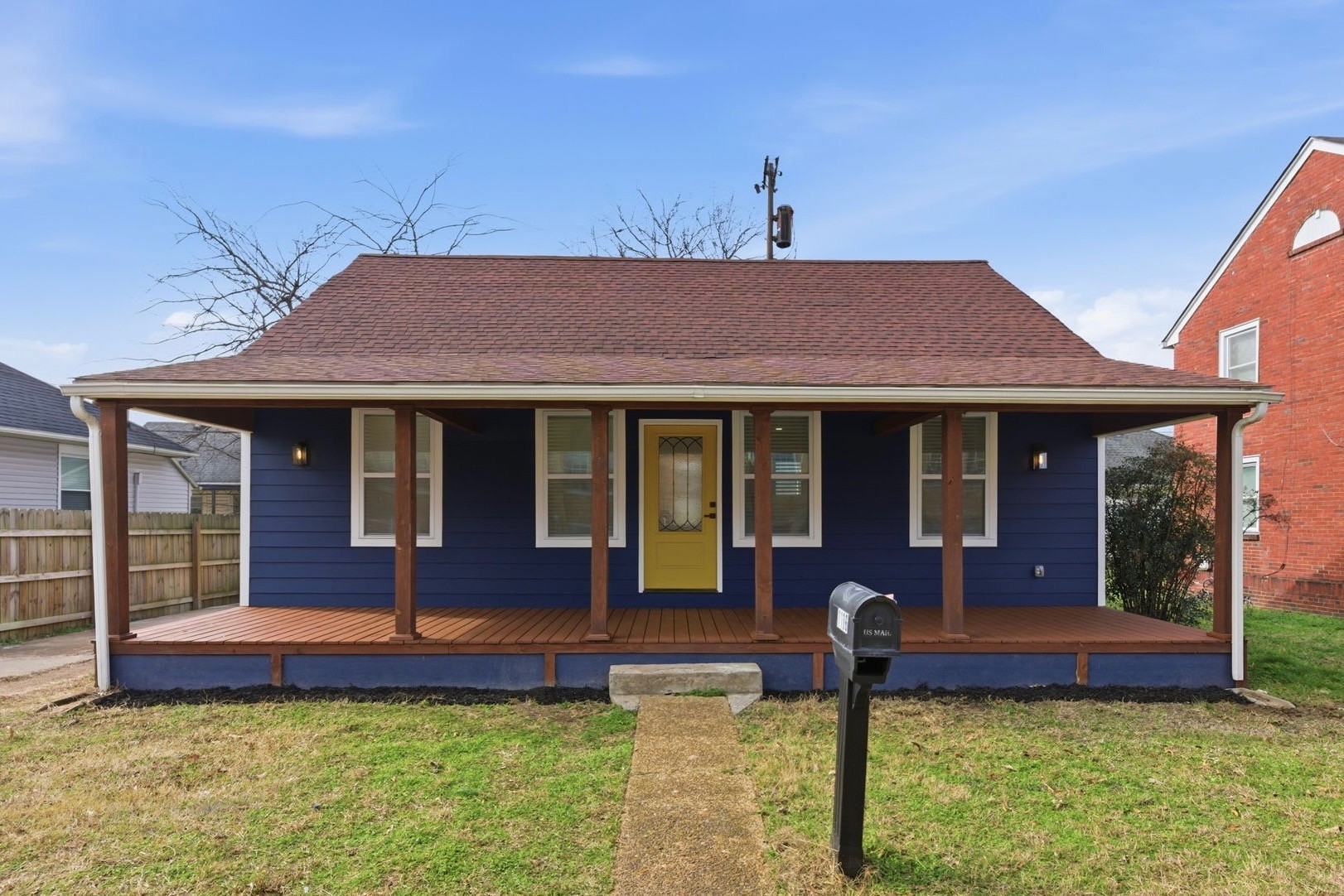 1106 Dodson Street Old Hickory, TN 37138 - Photo 1 of 27 a front view of a house with garden