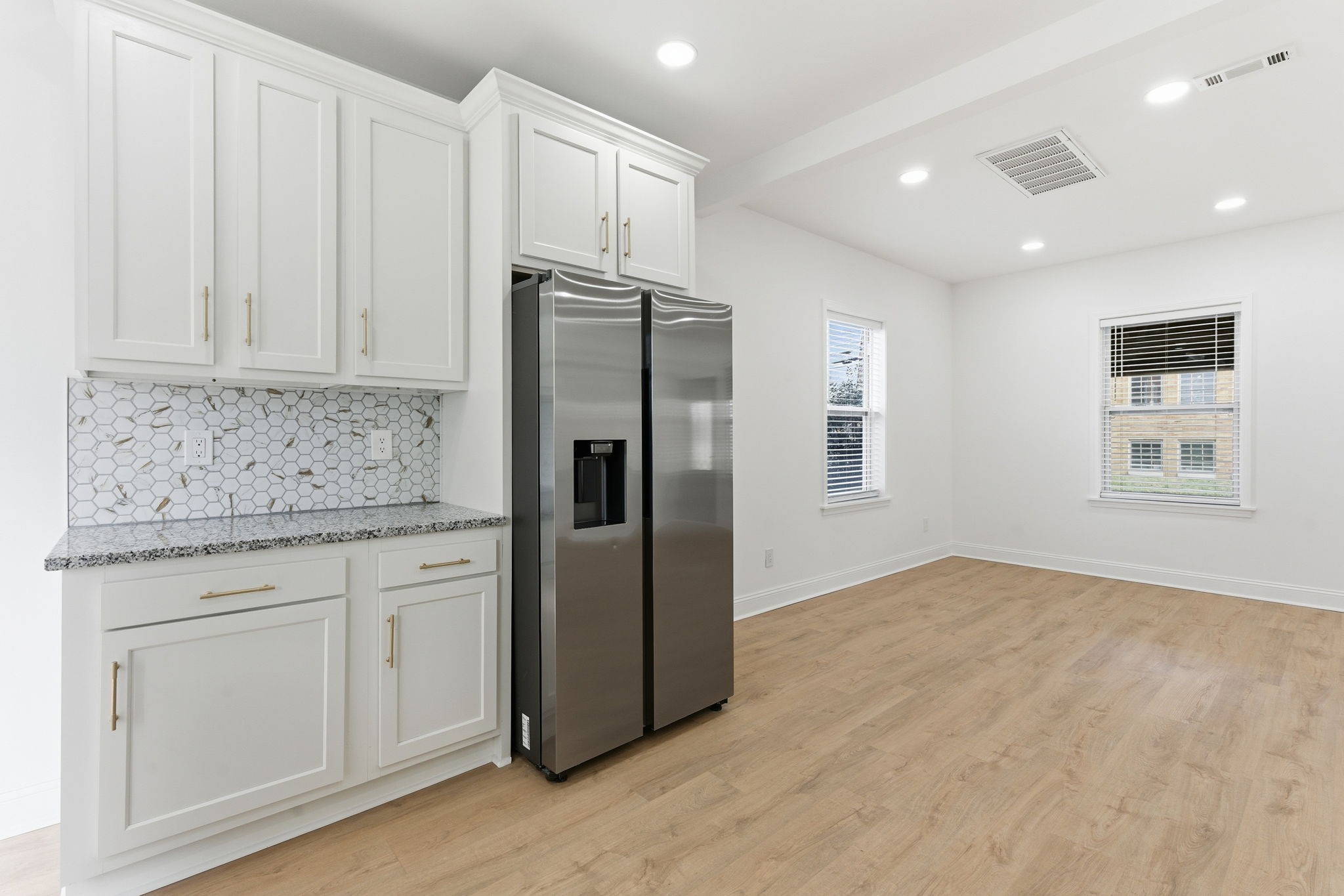 1106 Dodson Street Old Hickory, TN 37138 - Photo 12 of 27 a kitchen with stainless steel appliances granite countertop a refrigerator and a stove