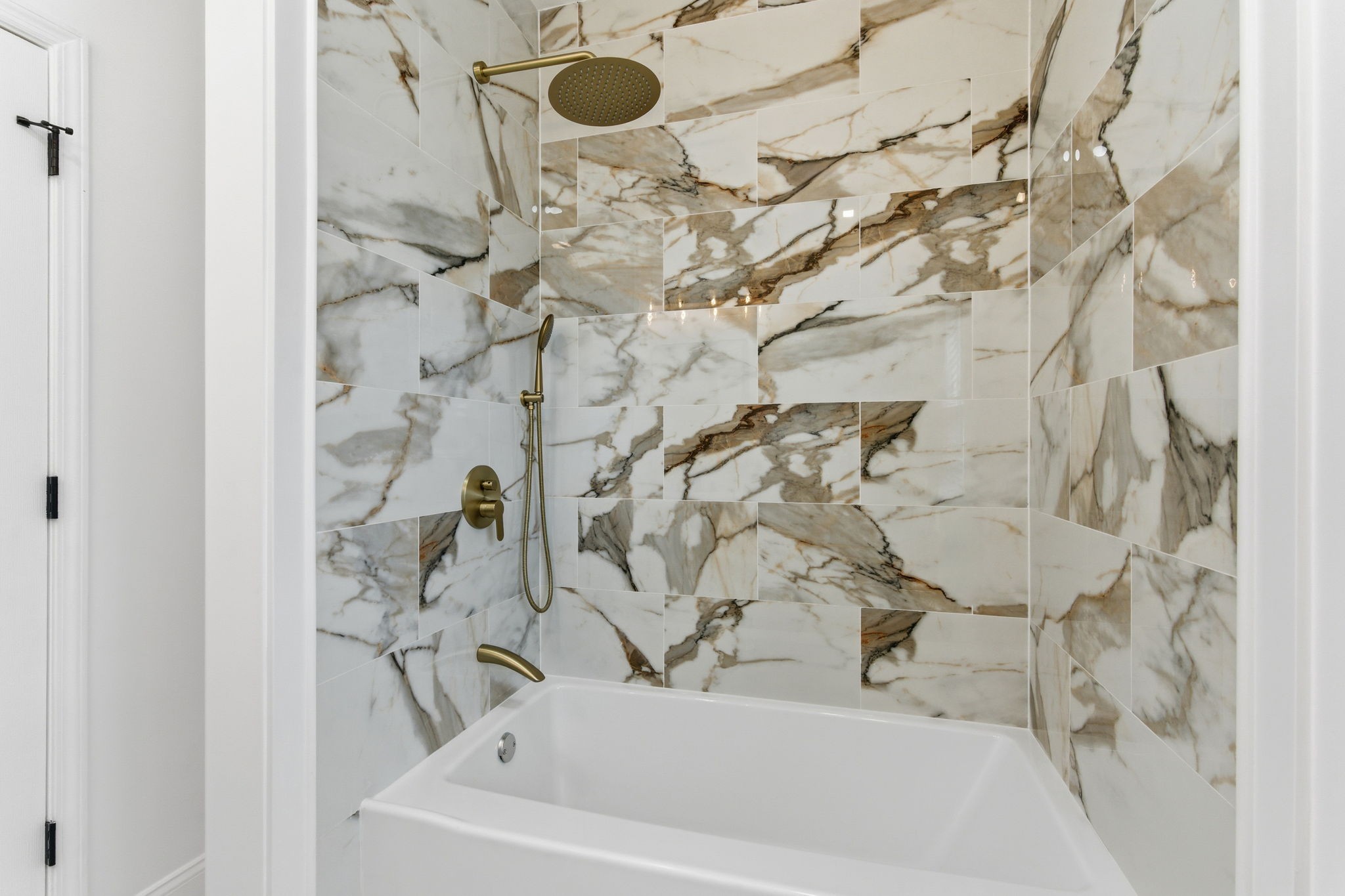 1106 Dodson Street Old Hickory, TN 37138 - Photo 14 of 27 a bathroom with a bathtub and shower