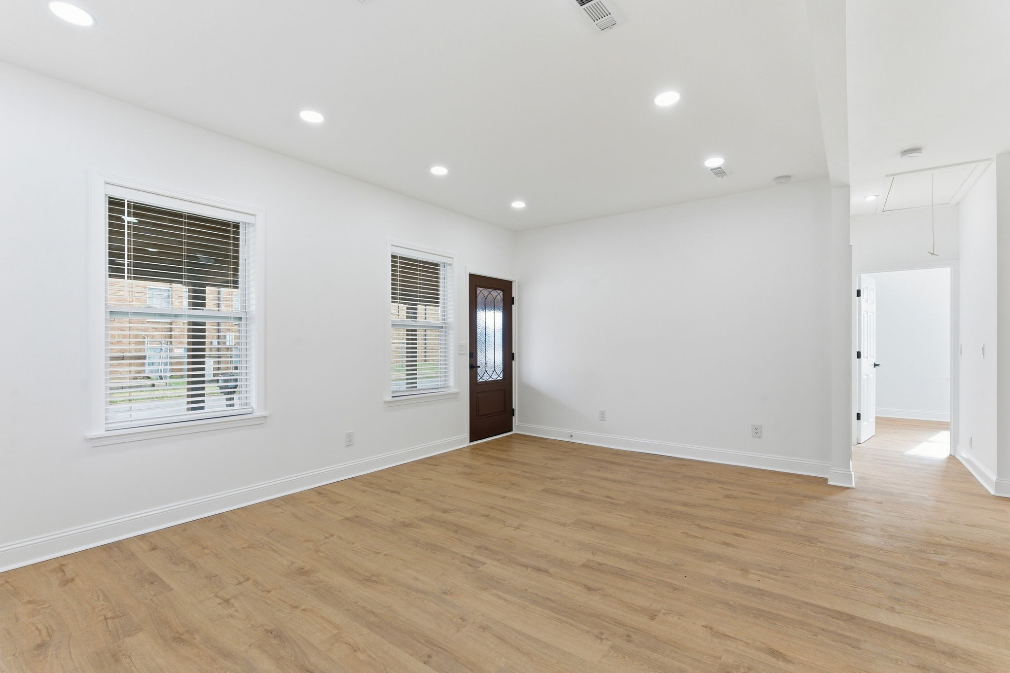 1106 Dodson Street Old Hickory, TN 37138 - Photo 9 of 27 an empty room with wooden floor and windows