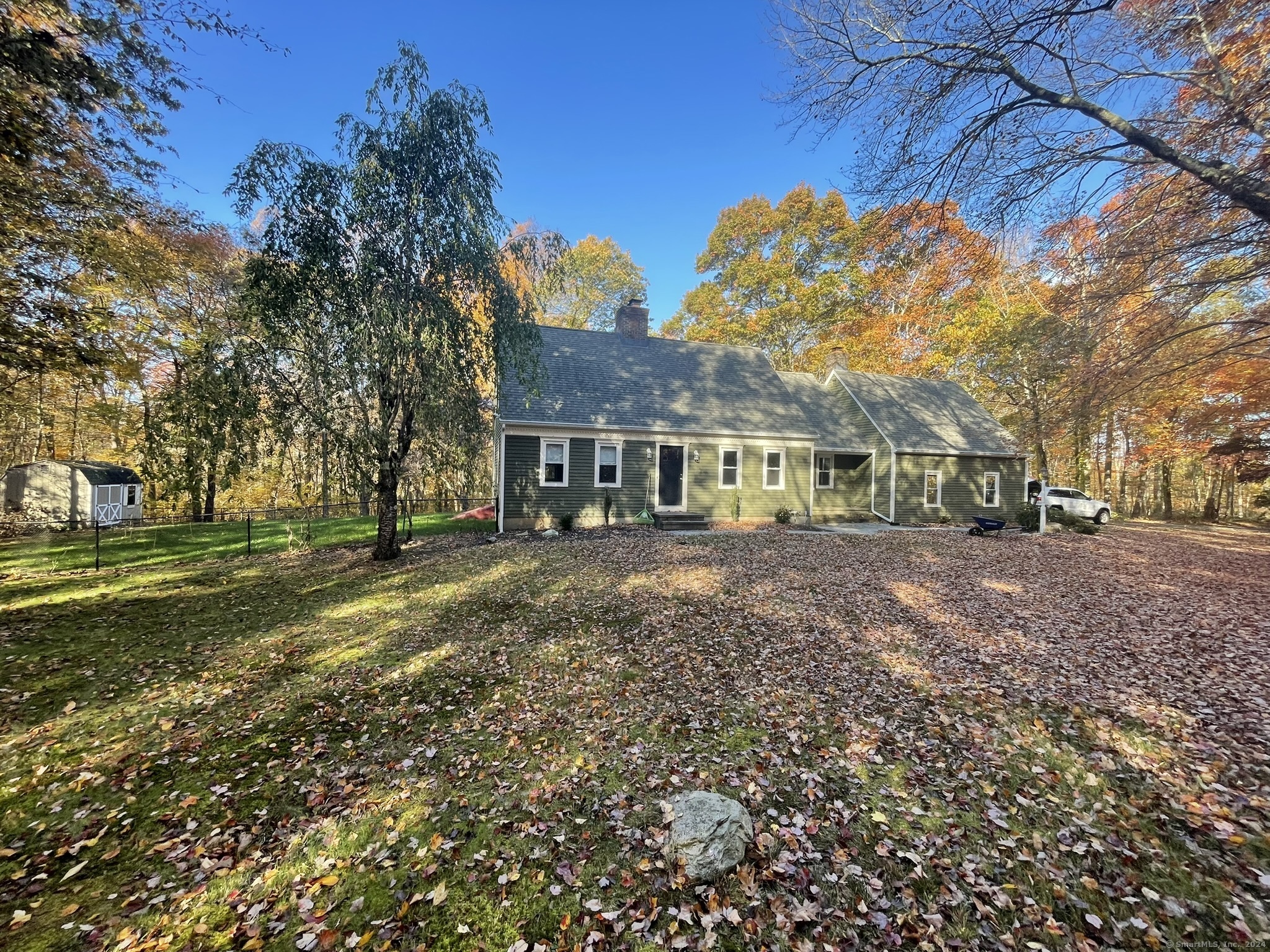 a view of house with outdoor space