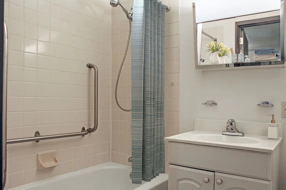 330 Main Street Fairhaven, MA 02719 - Photo 14 of 15 a bathroom with a sink a toilet and shower