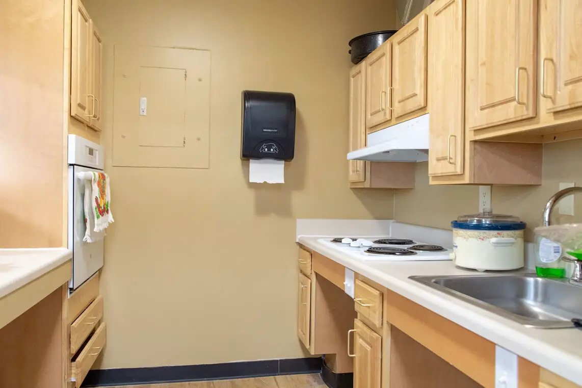 330 Main Street Fairhaven, MA 02719 - Photo 15 of 15 a kitchen with stainless steel appliances a stove a microwave and a refrigerator