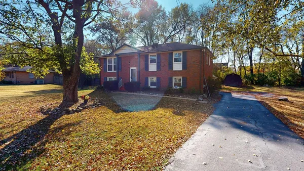 a view of a house with snow on the ground