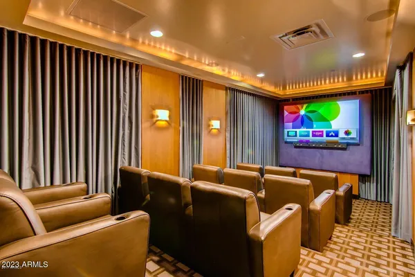 a view of a room with furniture and window