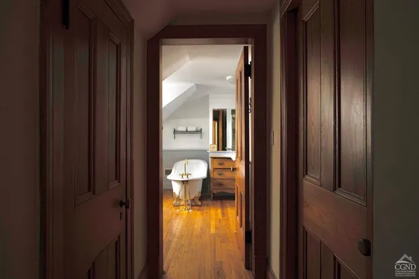 a view of entryway with wooden floor