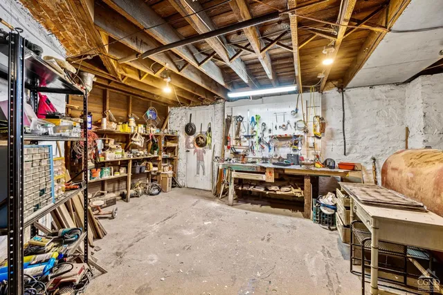 a view of multiple houses with a yard