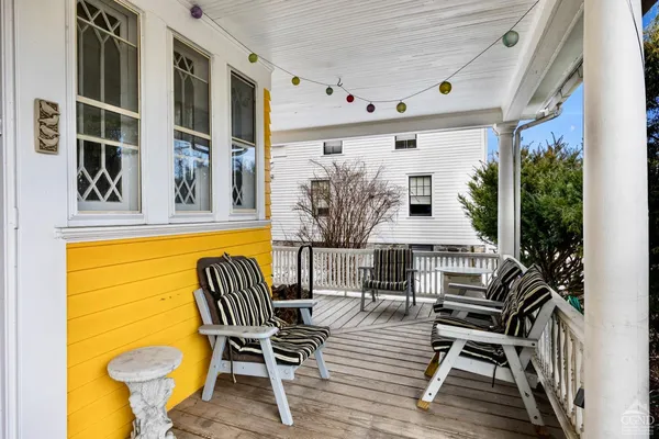 a view of a chairs and table in the patio