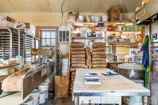 a picture of a book and a bed