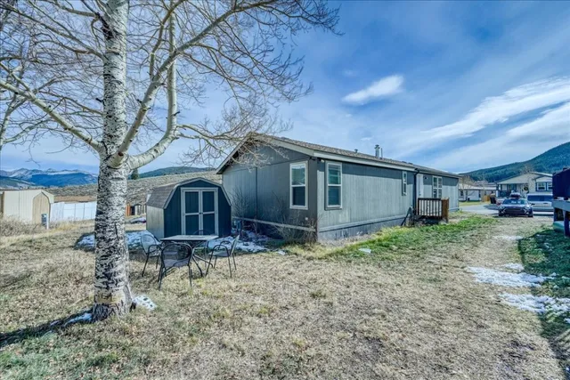 a house view with a backyard space