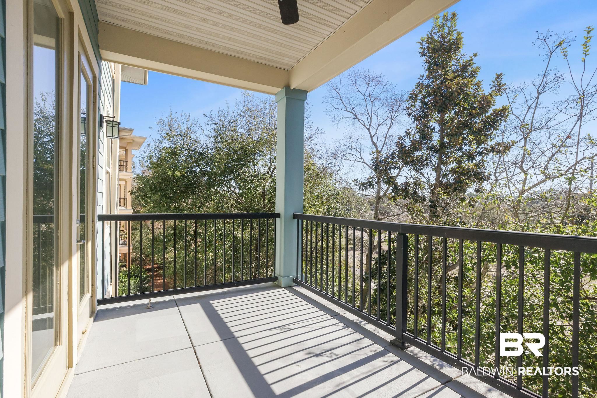 1430 Regency Road, Unit B302 Gulf Shores, AL 36542 - Photo 19 of 24 Balcony with a ceiling fan