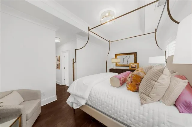 a bedroom with two washing machine