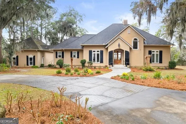 a front view of a house with a porch