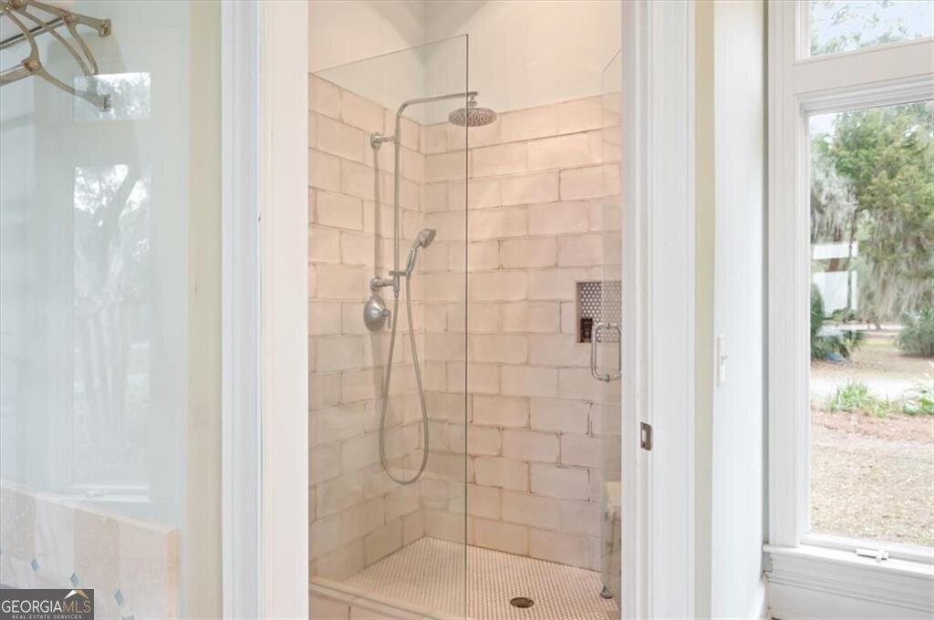 1045 River Club Road Northeast Townsend, GA 31331 - Photo 29 of 85 a bathroom with a shower