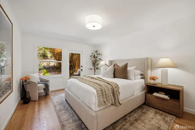 a bed room with a bed and a couch