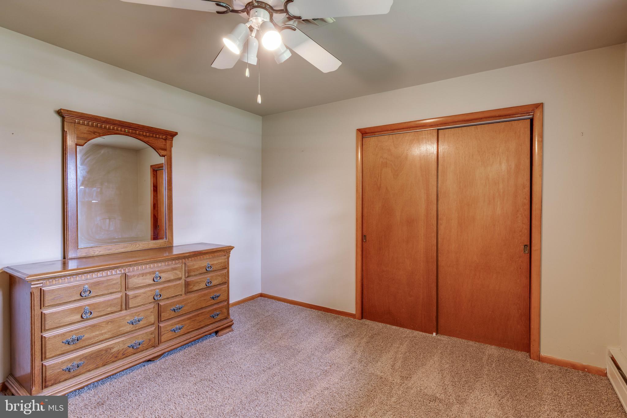 2500 Crestview Drive Fallston, MD 21047 - Photo 21 of 30 a view of a livingroom with a dresser cabinet and a mirror