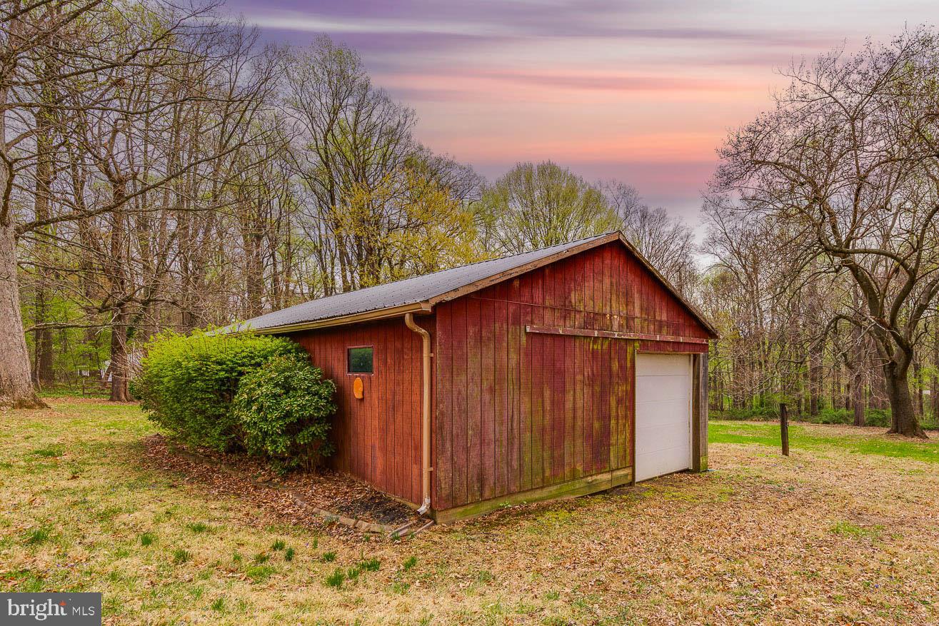 2500 Crestview Drive Fallston, MD 21047 - Photo 26 of 30 a view of a house with a wooden fence in a backyard