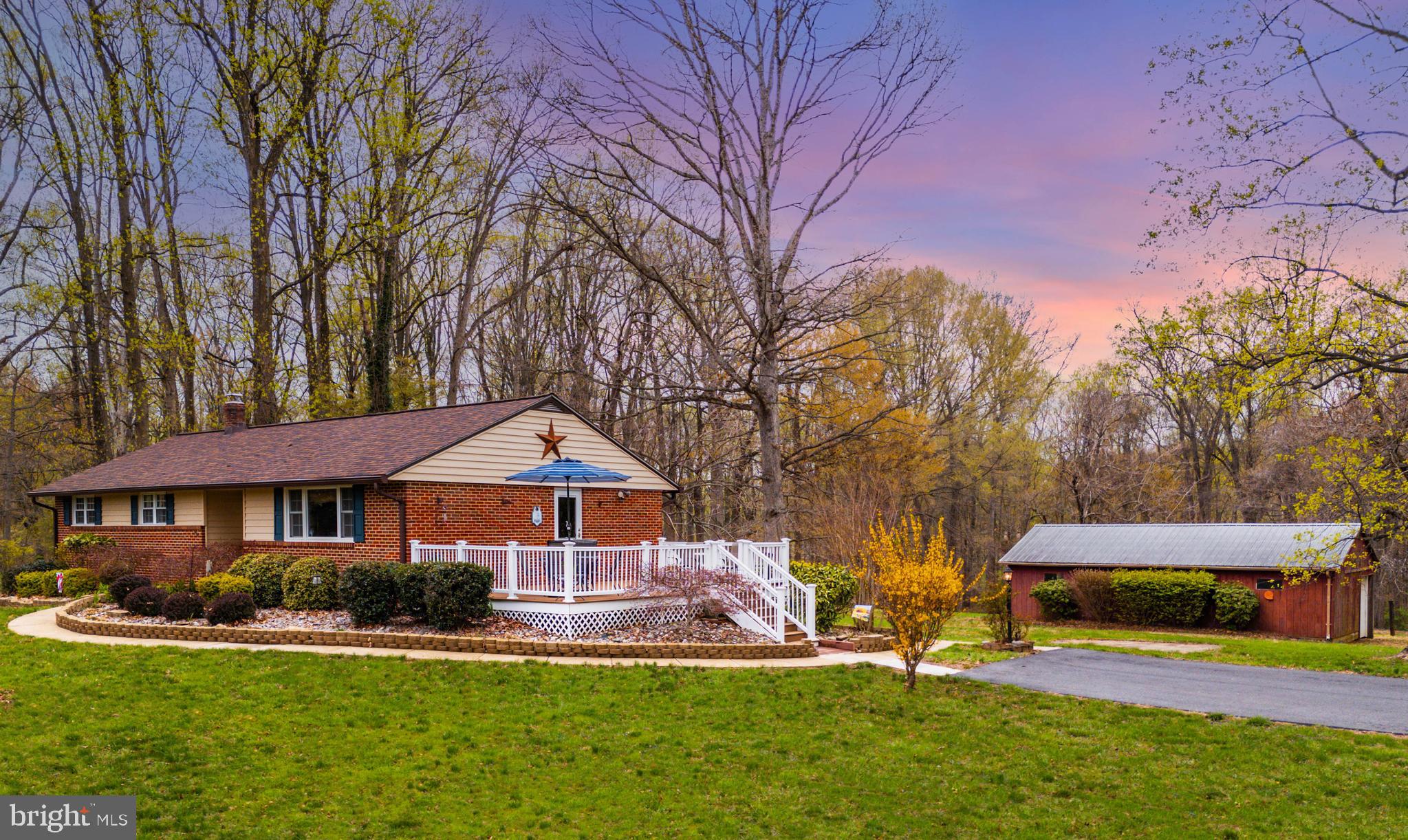 2500 Crestview Drive Fallston, MD 21047 - Photo 3 of 30 a front view of a house with a yard table and chairs