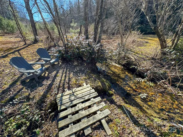 a view of a bench in a garden