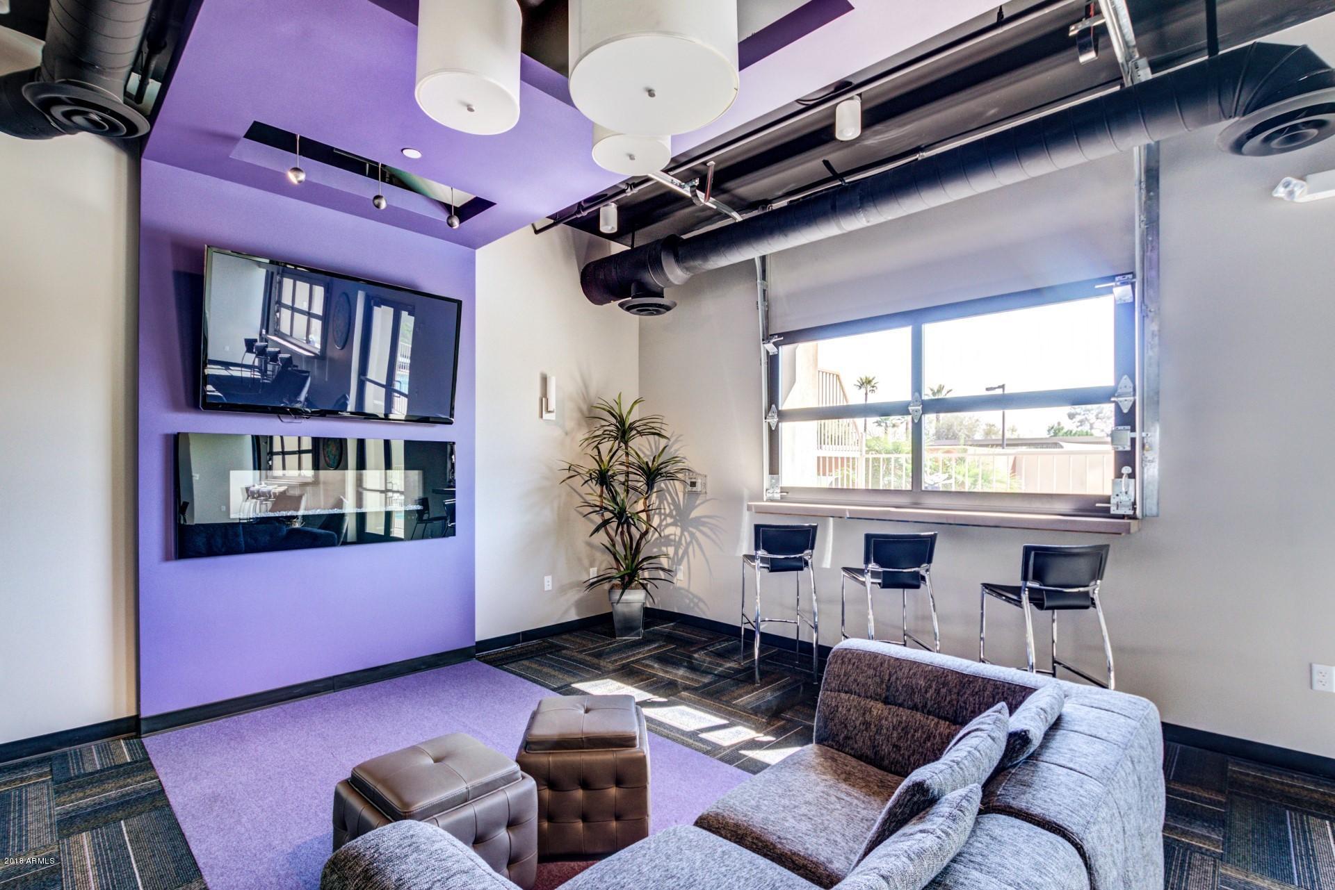 535 West Thomas Road, Unit 208 Phoenix, AZ 85013 - Photo 17 of 22 a living room with furniture and a window