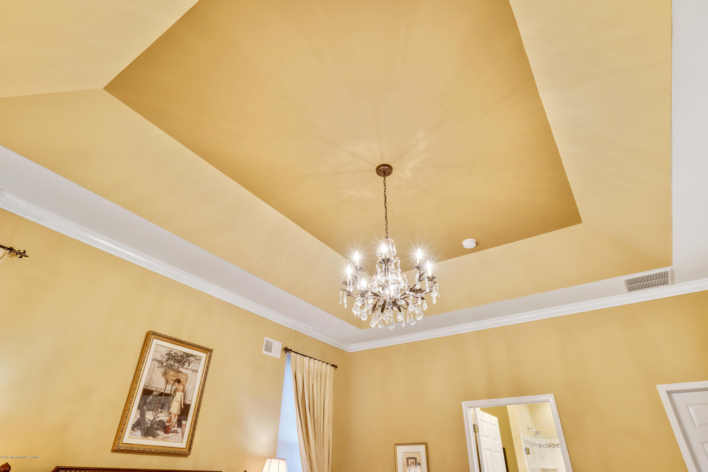 44 Crooked Stick Road Jackson, NJ 08527 - Photo 26 of 33 a view of a room with a chandelier furniture and windows