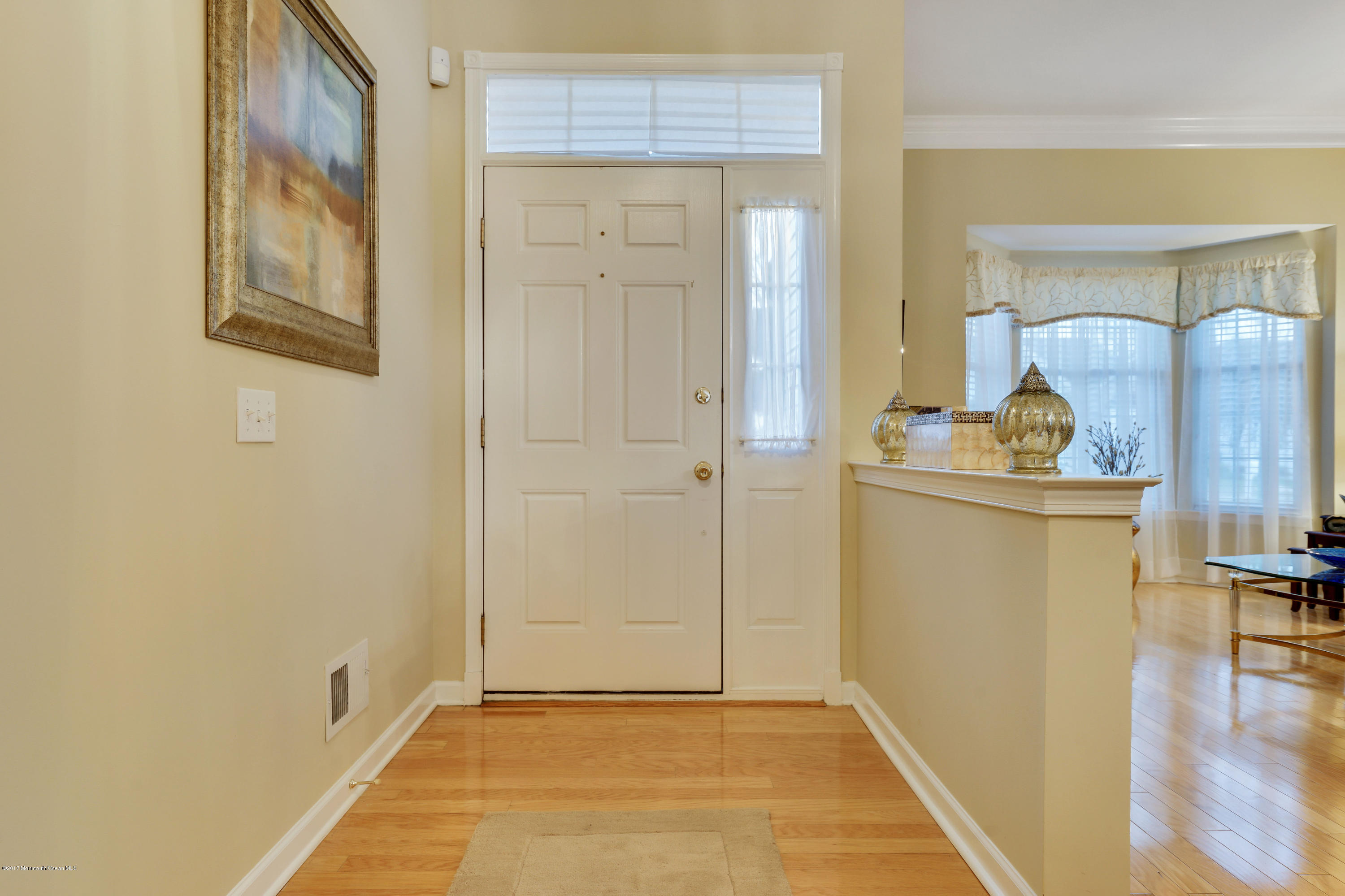 44 Crooked Stick Road Jackson, NJ 08527 - Photo 3 of 33 a view of a livingroom with wooden floor and cabinet