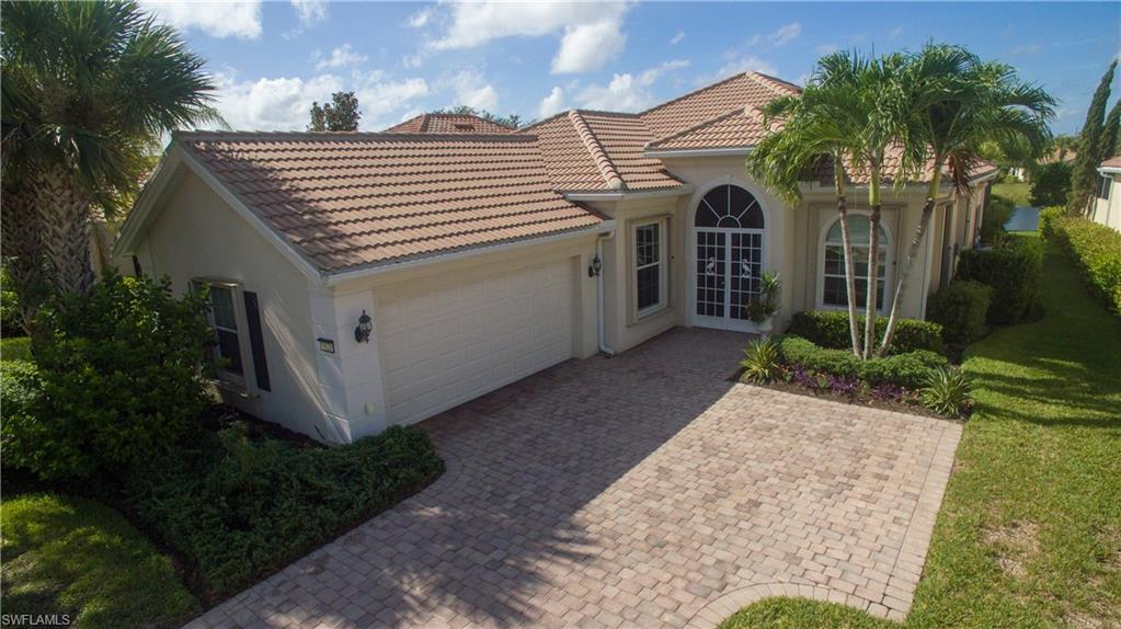 above the home, side load garage with extra large driveway