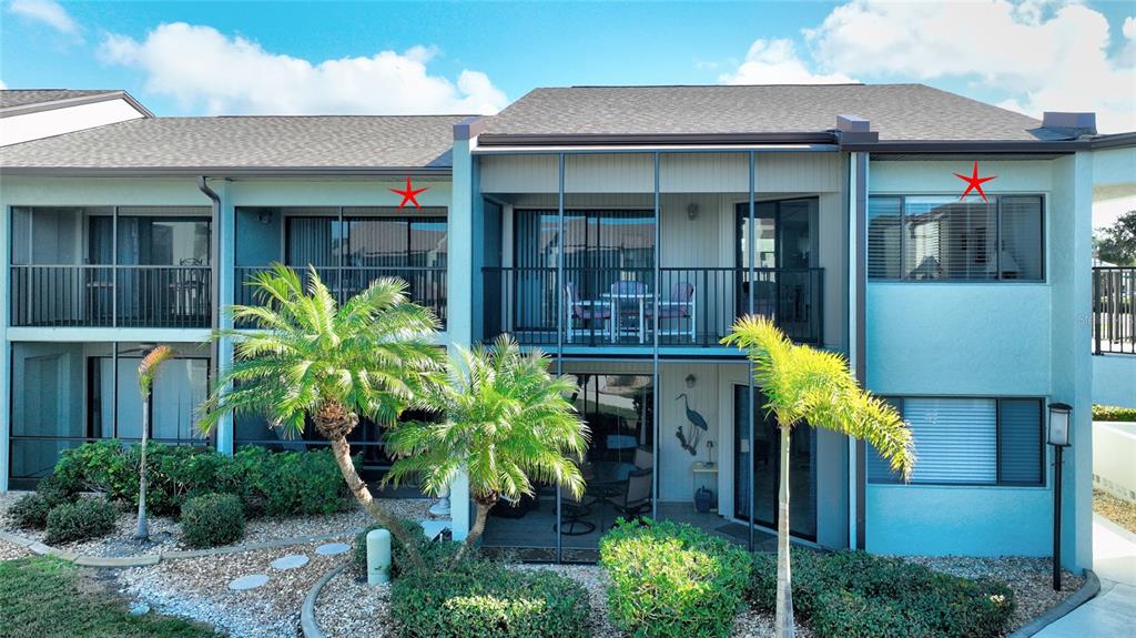 2001 Little Pine Circle, Unit 11B Punta Gorda, FL 33955 - Photo 31 of 45 a front view of a house