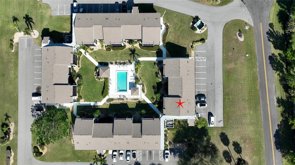2001 Little Pine Circle, Unit 11B Punta Gorda, FL 33955 - Photo 34 of 45 an aerial view of residential house with outdoor space and swimming pool