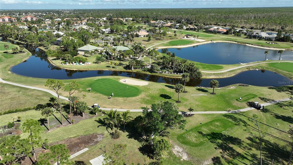 2001 Little Pine Circle, Unit 11B Punta Gorda, FL 33955 - Photo 41 of 45 an aerial view of residential houses with outdoor space