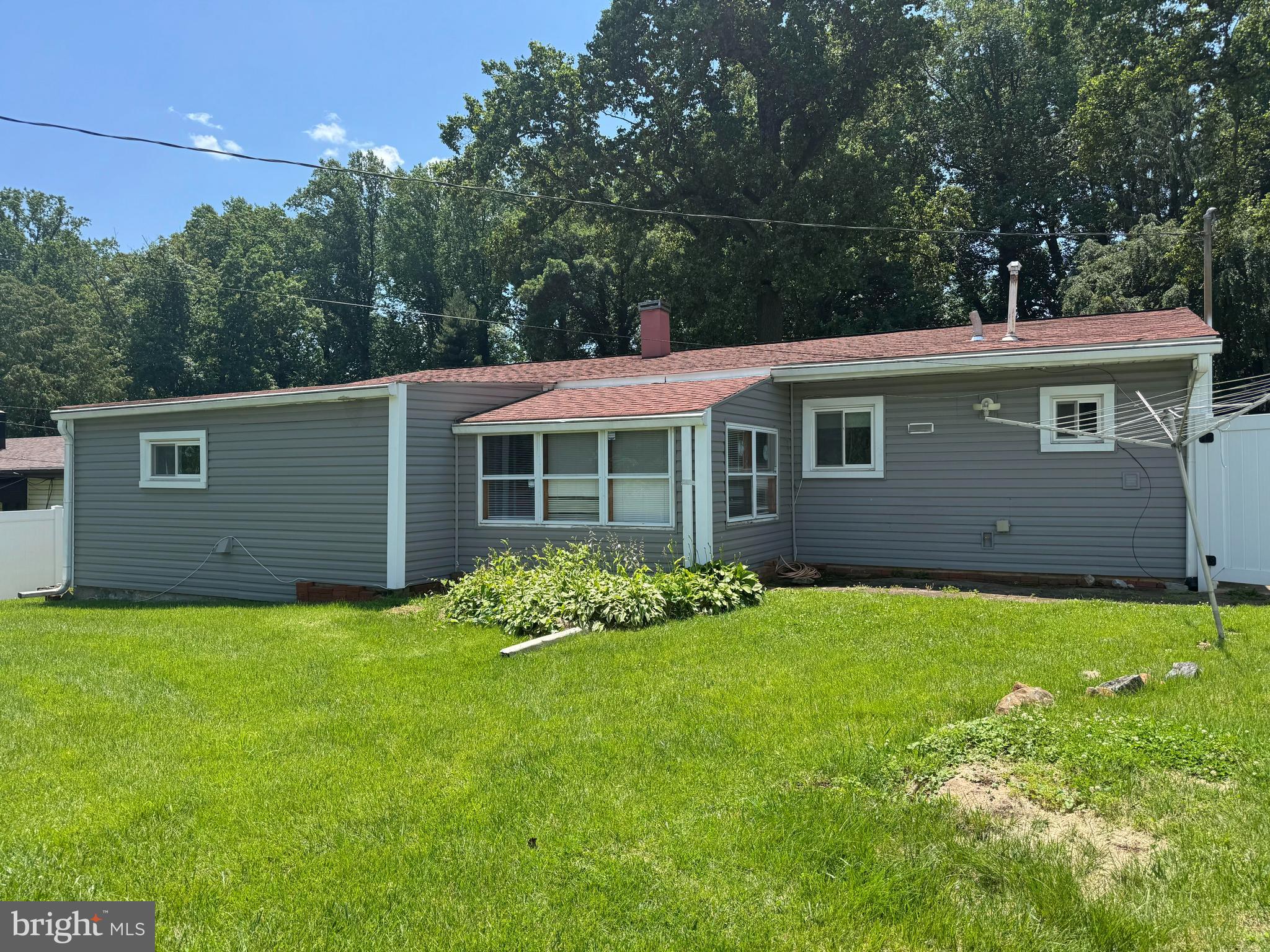 6703 Alter Street Baltimore, MD 21207 - Photo 2 of 12 a view of a house with a yard
