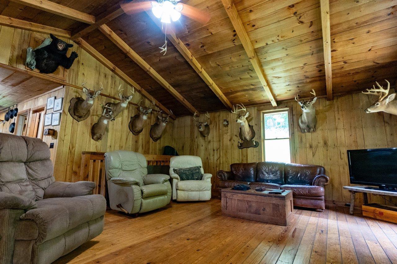 0 Foothills Road Callaway, VA 24067 - Photo 18 of 47 a living room with furniture and a flat screen tv