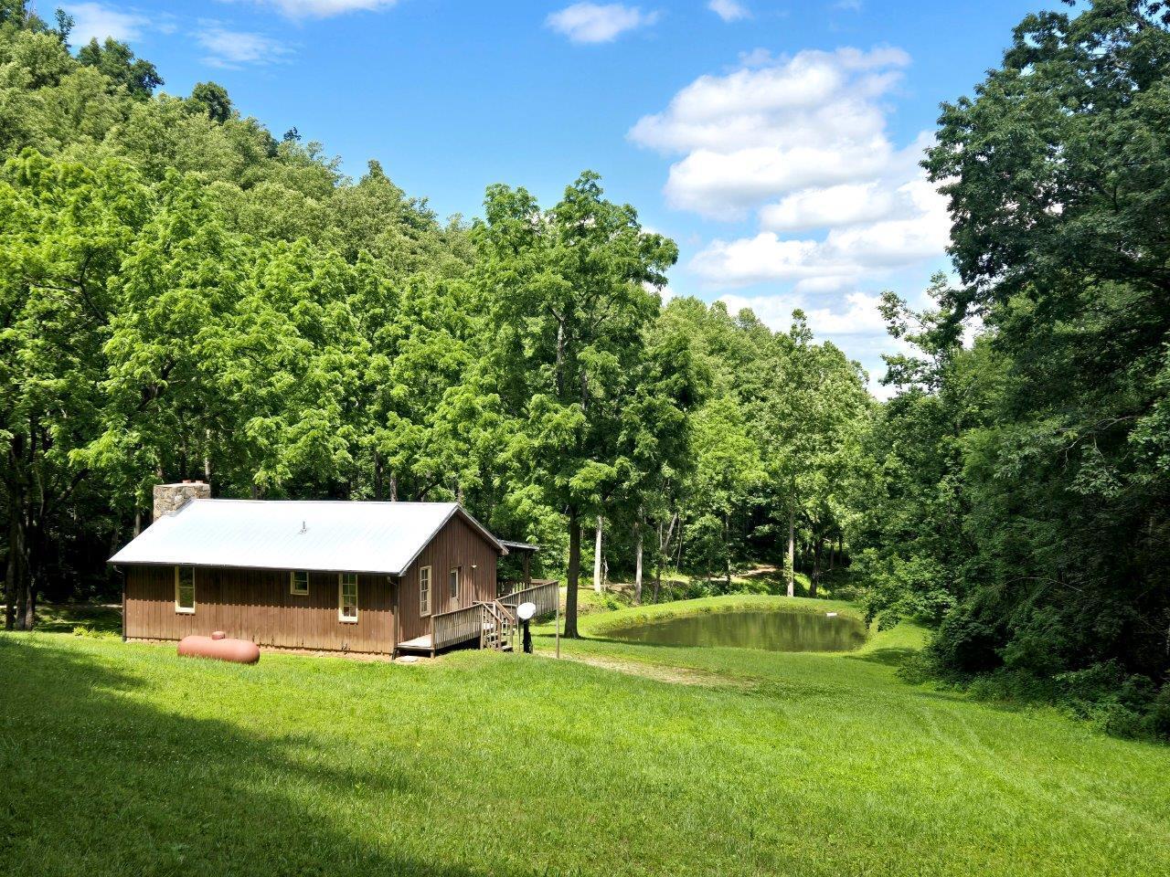0 Foothills Road Callaway, VA 24067 - Photo 28 of 47 a view of a house with a big yard and large trees
