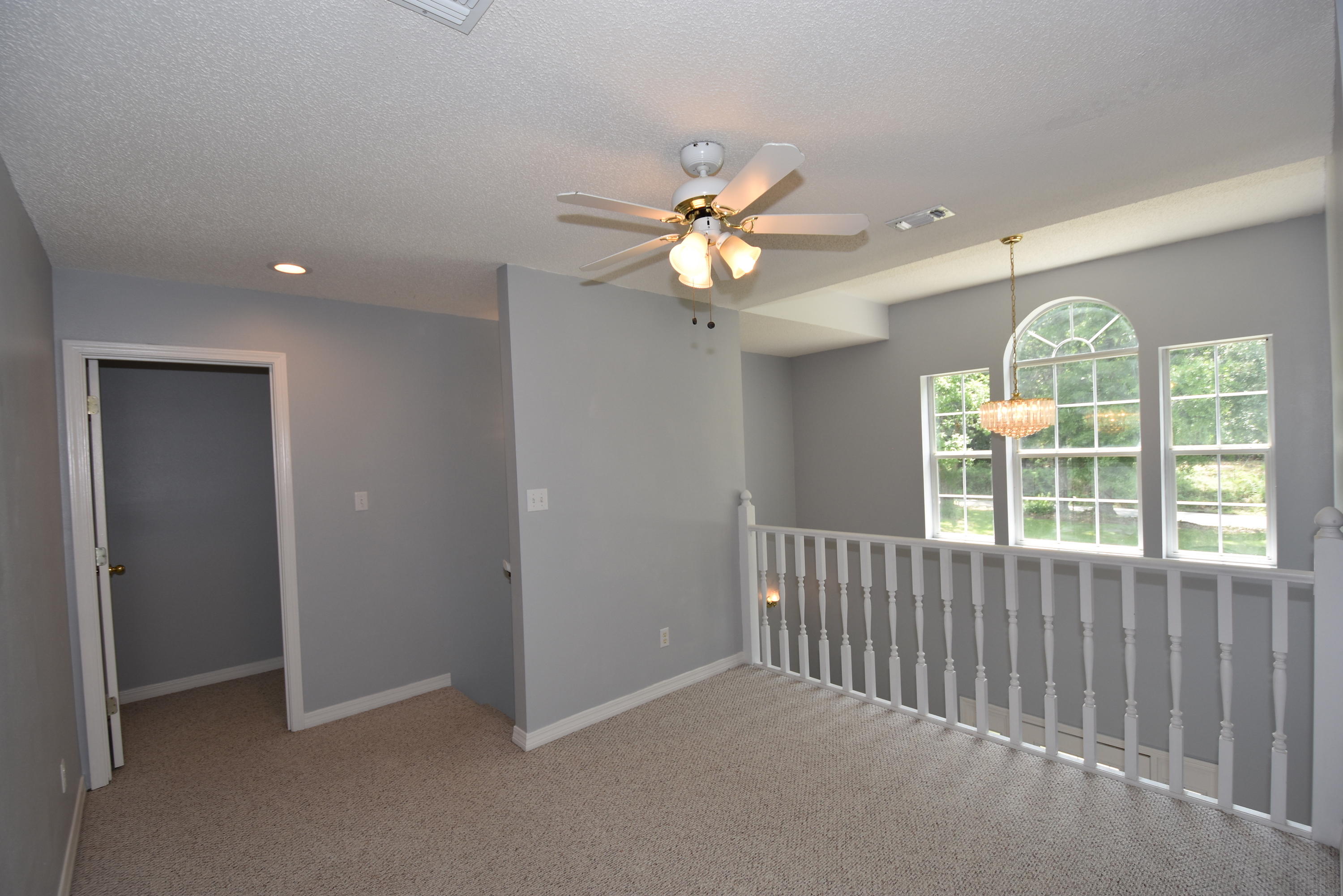 5817 Dairy Road Baker, FL 32531 - Photo 23 of 36 a view of a livingroom with a ceiling fan and window